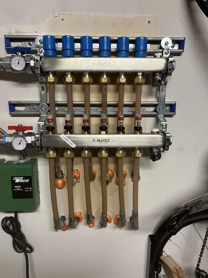 Plumber performing Water Heater Repair at a residential property in Yellow Springs